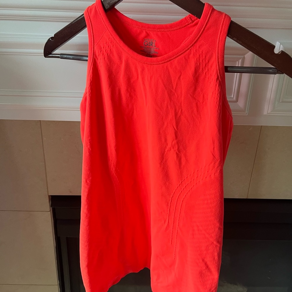 Girls Athleta Girl bright orange razorback workout tank size 14 (XL)
